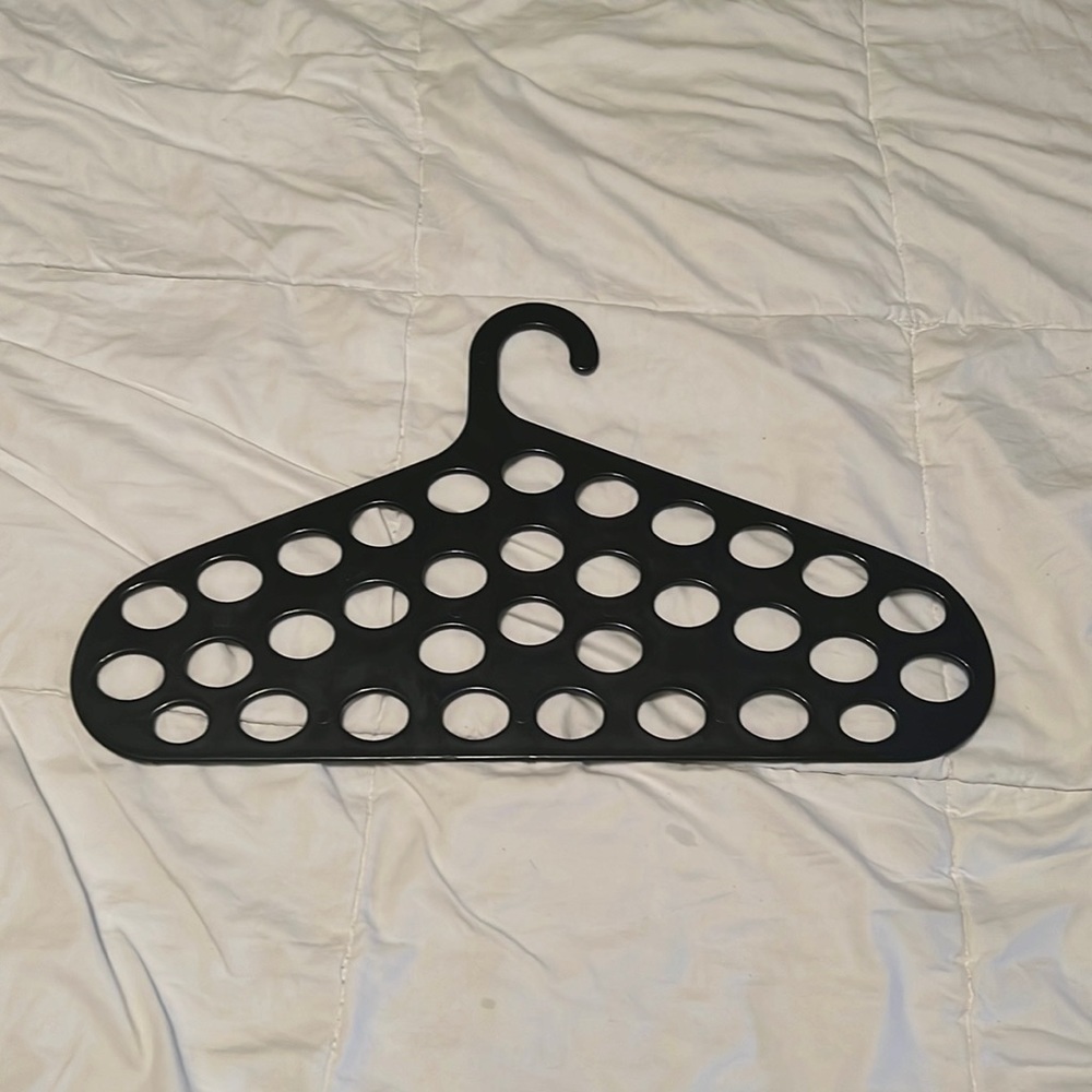 Plastic scarf and belt holder
